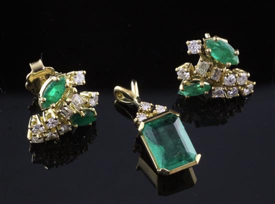 A modern gold, emerald and diamond set pendant and a similar pair of ear studs,